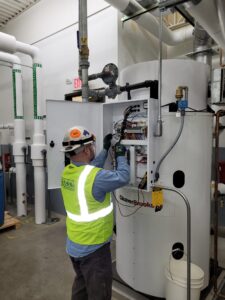 Working on a commercial boiler